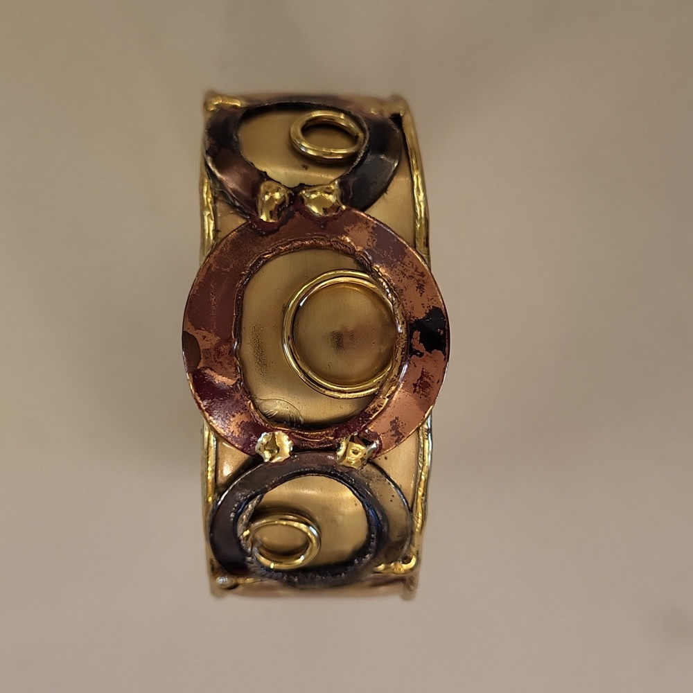 Metal cuff bracelet handmade with circle geometric pattern